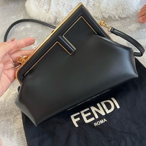 Fendi first small, brand new with plastic paper on.